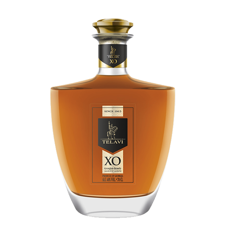 Telavi XO gruzínská 20 letá brandy - 0,7 l Gruzínský koňak XO Telavi 20 letý je ztělesněním výjimečné kvality a bohaté tradice. Zralé hrozny, pečlivě vybrané pro výrobu této brandy, dodávají Telavi XO bohatou, plnou a výraznou chuť. Každého milovníka brandy okouzlí svou komplexností a dlouhotrvajícím dozvukem na jazyku. Vyráběna podle tradičních gruzínských metod s důrazem na preciznost a pečlivý výběr surovin, každá láhev nese razítko kvality, které garantuje její autenticitu. Gruzínský koňak Telavi XO s jemnou chutí z Gruzie v elegantní lahvi o objemu 700 ml