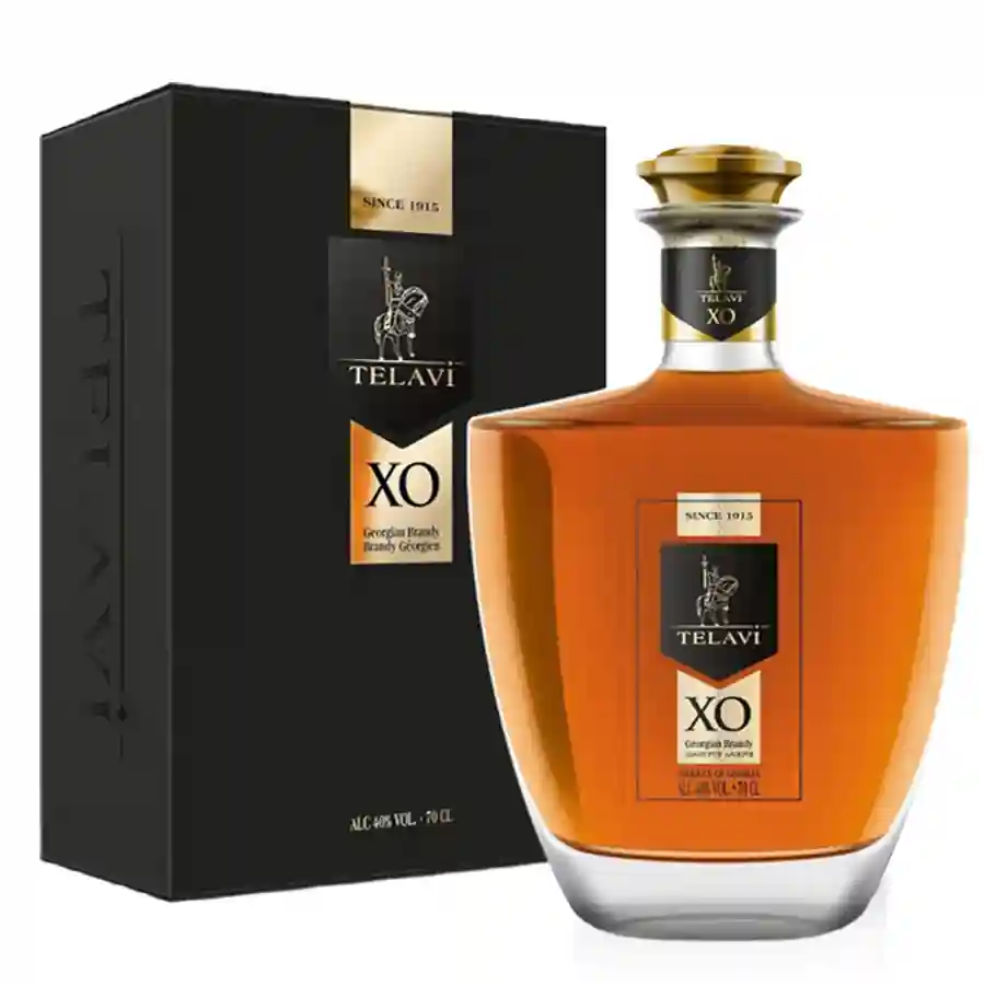Telavi XO gruzínská 20 letá brandy - 0,7 l Gruzínský koňak XO Telavi 20 letý je ztělesněním výjimečné kvality a bohaté tradice. Zralé hrozny, pečlivě vybrané pro výrobu této brandy, dodávají Telavi XO bohatou, plnou a výraznou chuť. Každého milovníka brandy okouzlí svou komplexností a dlouhotrvajícím dozvukem na jazyku. Vyráběna podle tradičních gruzínských metod s důrazem na preciznost a pečlivý výběr surovin, každá láhev nese razítko kvality, které garantuje její autenticitu. Gruzínský koňak Telavi XO gruzínská brandy v elegantní lahvi s černým dárkovým obalem, typický produkt z Gruzie